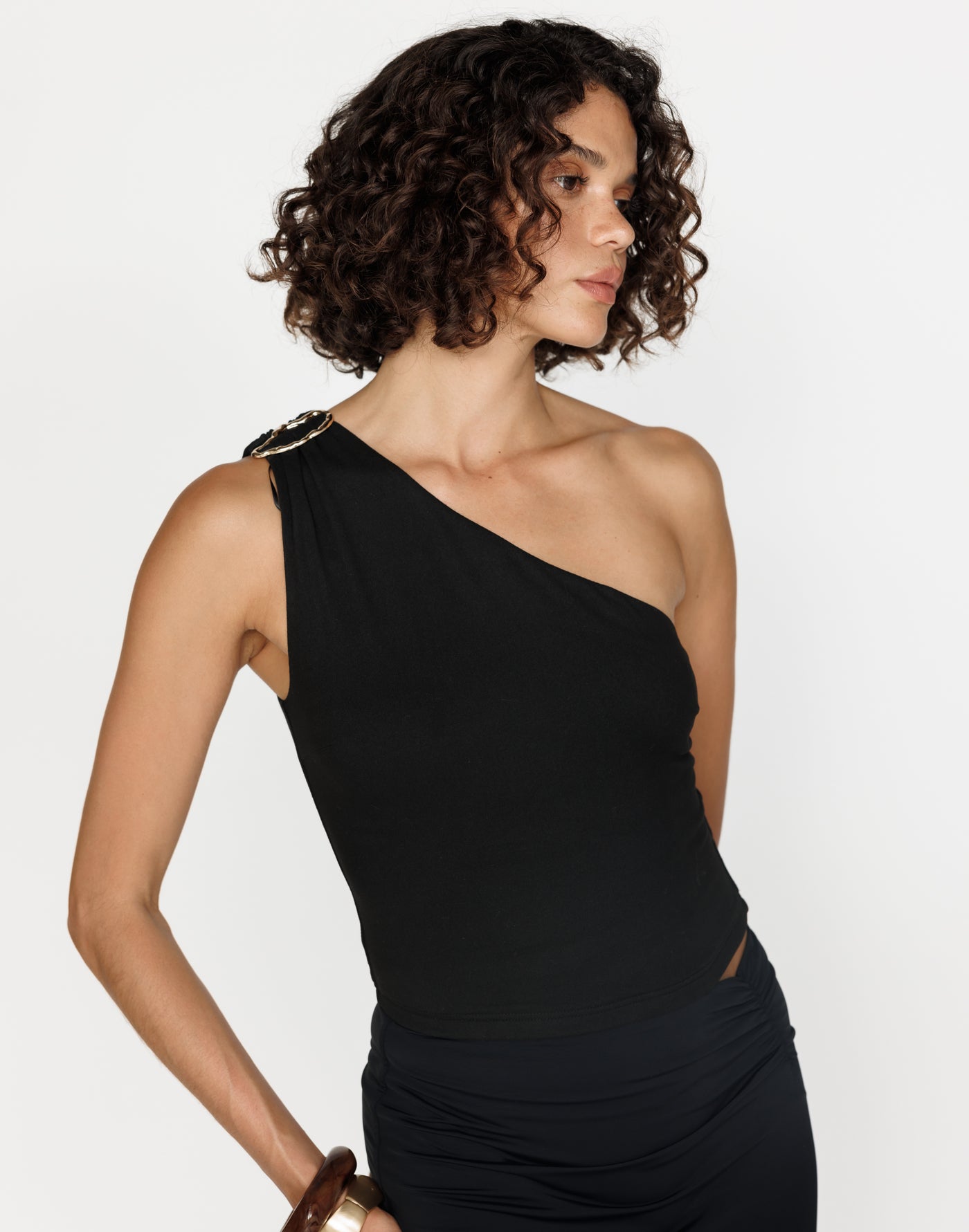 Nikolette Top (Black) | CHARCOAL Exclusive - Asymmetrical Neckline Bodycon Top w/ Gold Embellishment - Women's Top - Charcoal Clothing